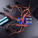 Explore Using a Customized Arduino Nano-based Board to Wirelessly Control Up to 9 Servo Motors Via Bluetooth